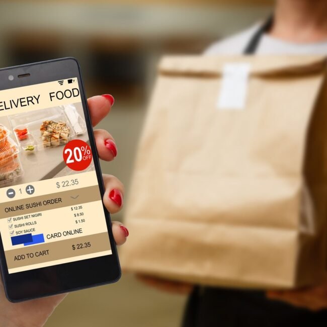 woman-holding-phone-with-app-delivery-food-screen-2026-01-09-13-42-59-utc